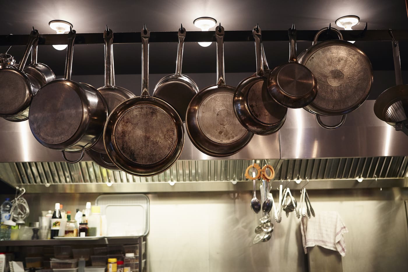 Pans hanging in commercial kitchen